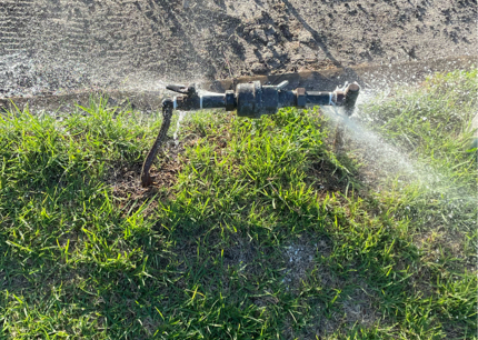 Image of water spurting from water meter